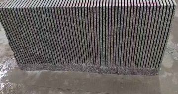 沈阳芝麻白毛板荒料切割