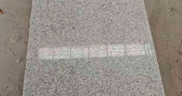 沈阳芝麻白光面毛板